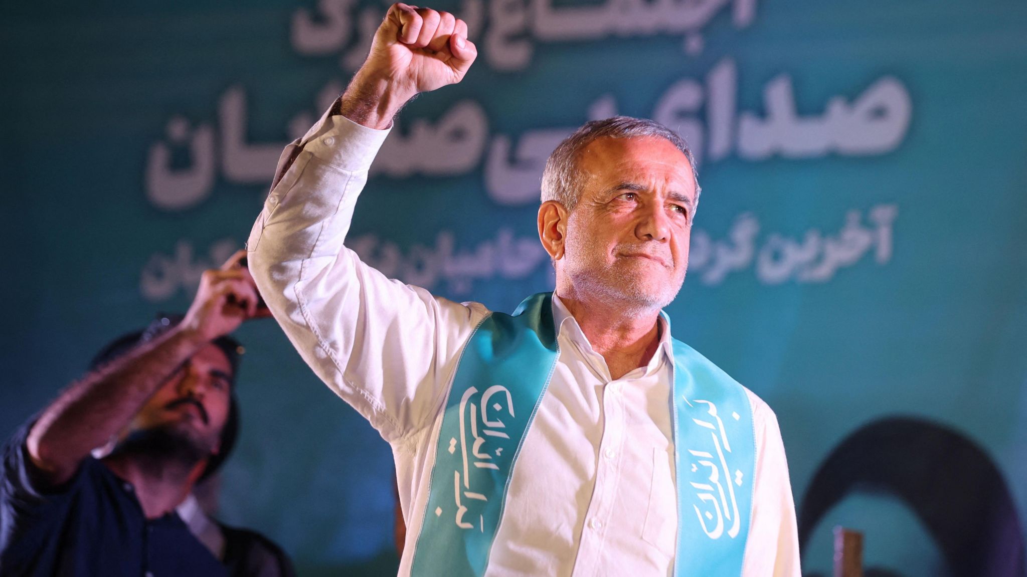 Reformist Iranian President Pezeshkian posing for the cameras