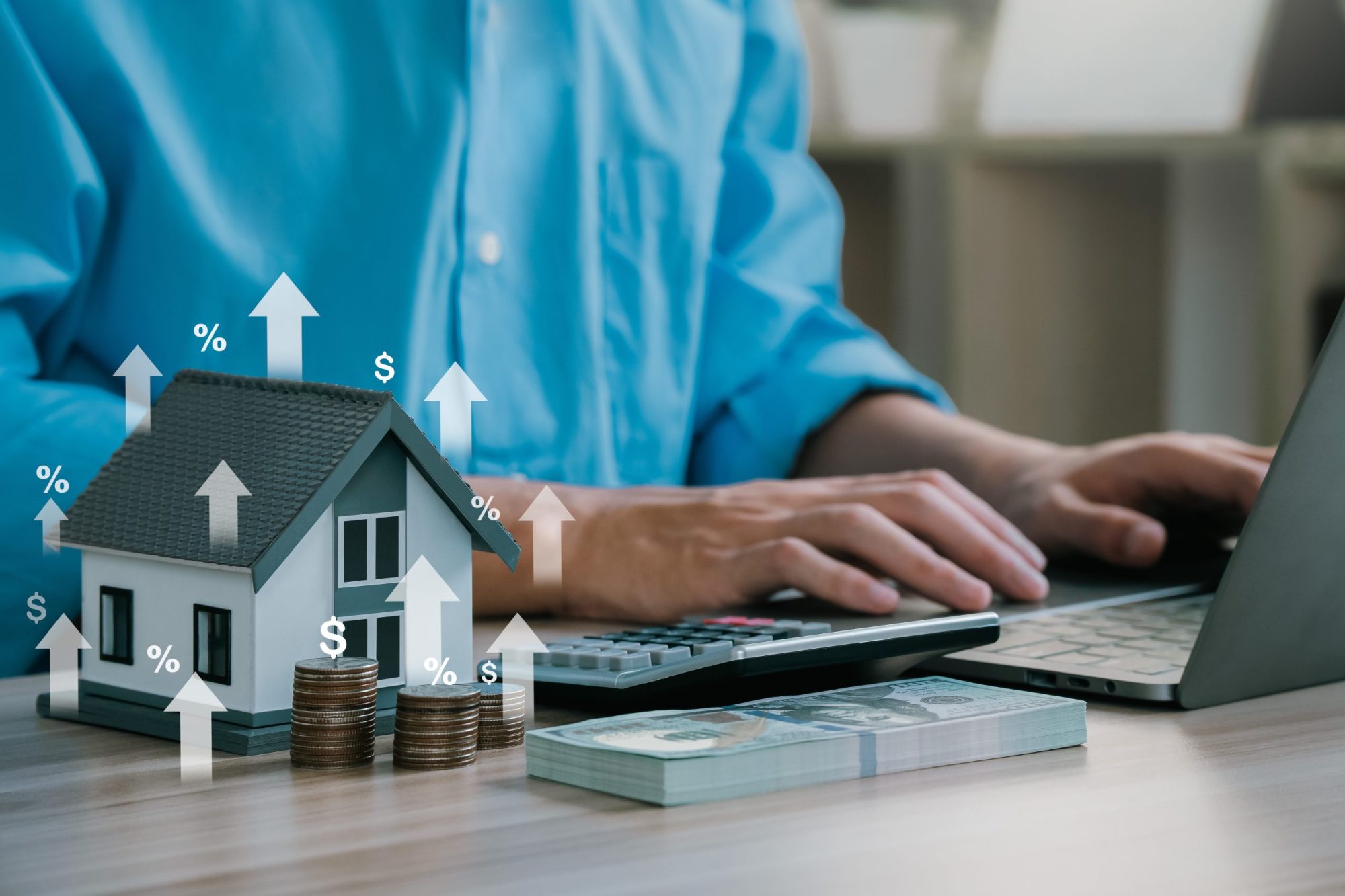 A person working, with a graphic of a house going up in value next to the person. Green Belt