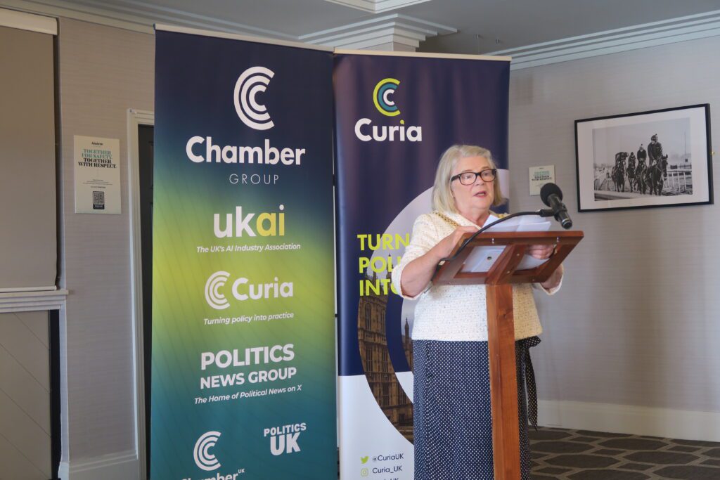 This pictures Councillor Barbara Murray speaking at the North West Conference.