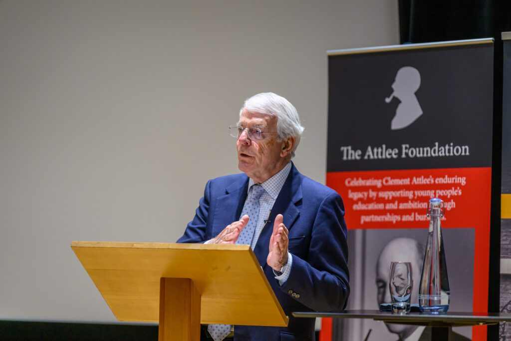 Sir John Major warned against empty reformism at The Strand Group and Attlee Foundation lecture. (Photo: The Strand Group)