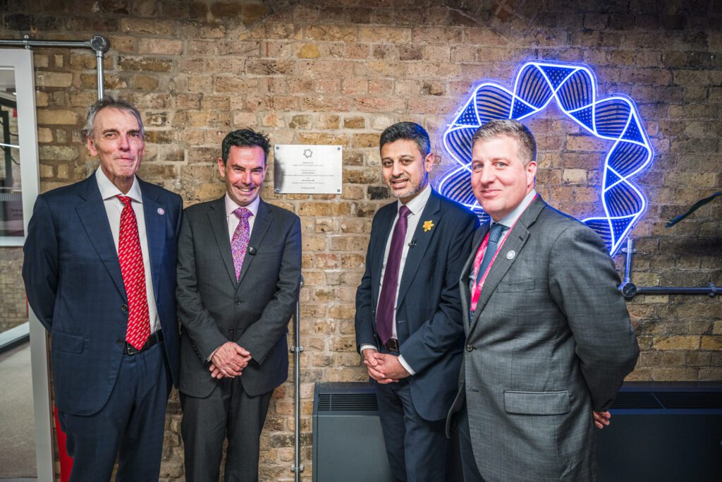 The Minister for Health Innovation, Zubir Ahmed MP unveiled a plaque opening the new Genomics offices in the heart of the Knowledge Quarter. (Left to right: Professor Sir Peter Donnelly, CEO and Founder, Genomics, Steve Bates, Executive Chair, Office for Life Sciences, Zubir Ahmed MP, Minister for Health Innovation, Department of Health and Social Care, and Dave Thornton, President, Genomics)