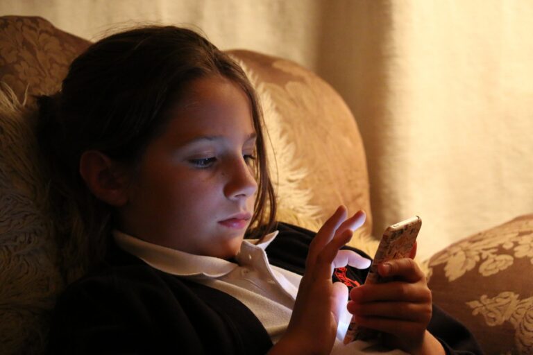 Girl Scrolling Under-16 Social Media Ban