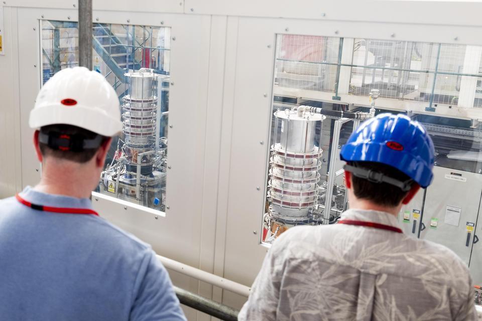 PPPL's Deputy Director of Research for the National Spherical Torus Experiment Upgrade, Jack Berkery and Head of MAST Upgrade at UKAEA, Andrew Thornton viewing two fusion gyrotrons for MAST Upgrade's new heating system at UKAEA’s Culham Campus. (Photo: United Kingdom Atomic Energy Authority)