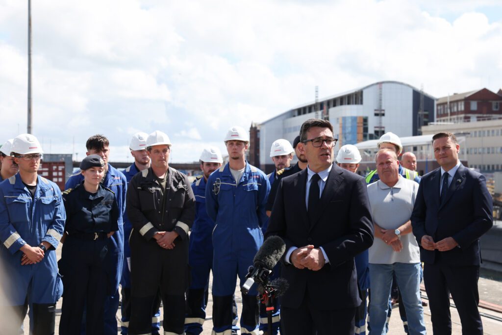 Prime Minister, Andy Burnham address staff at the BAE Systems nuclear submarine base in Barrow-in-Furness. (Photo: Lauren Hurley/No 10 Downing Street)
