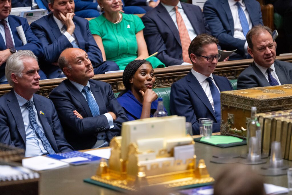 With her freshly reshuffled Shadow Frontbench team, Conservative Leader Kemi Badenoch argued that greater government spending and control under Burnham would not prevent companies leaving Britain. (Photo: House of Commons)